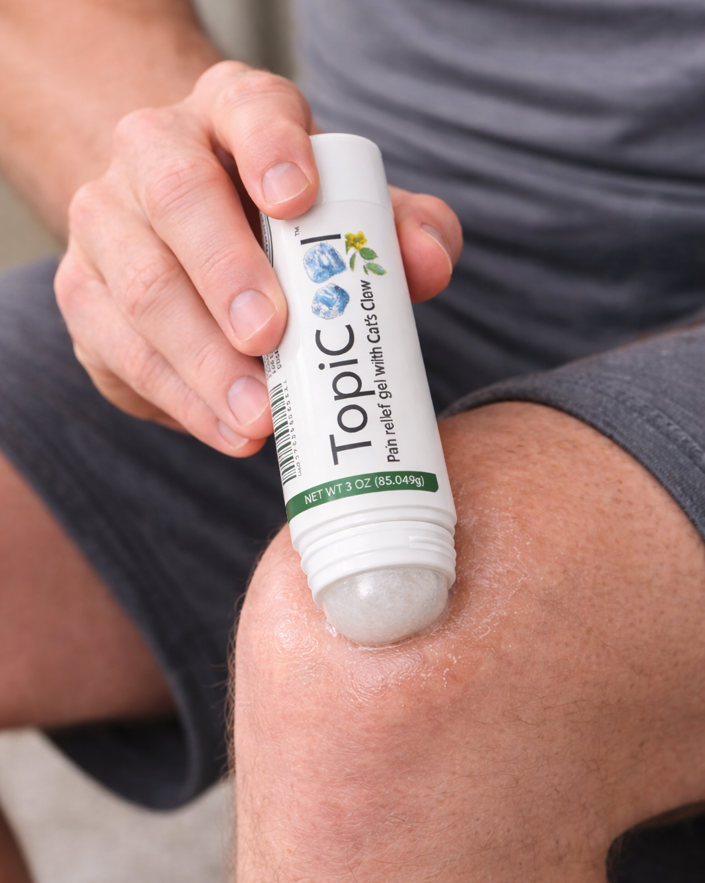 Person applying Topic cream to their knee